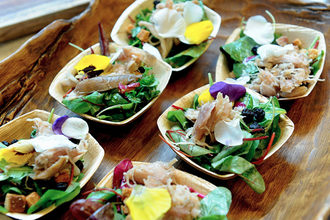 Roots of America rabbit confit foraged green salad with whiskey grain crumb and Madeira brown butter vinaigrette